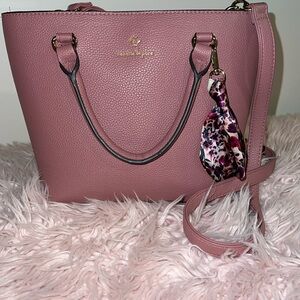 I am selling a pink handbag by Nanette Lepore. It came as a pair with a mini one